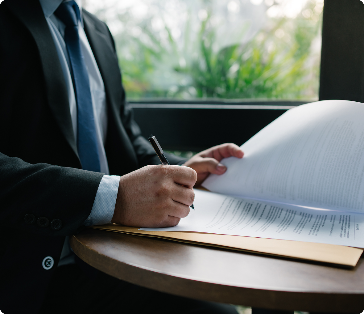 Professional reviewing paperwork